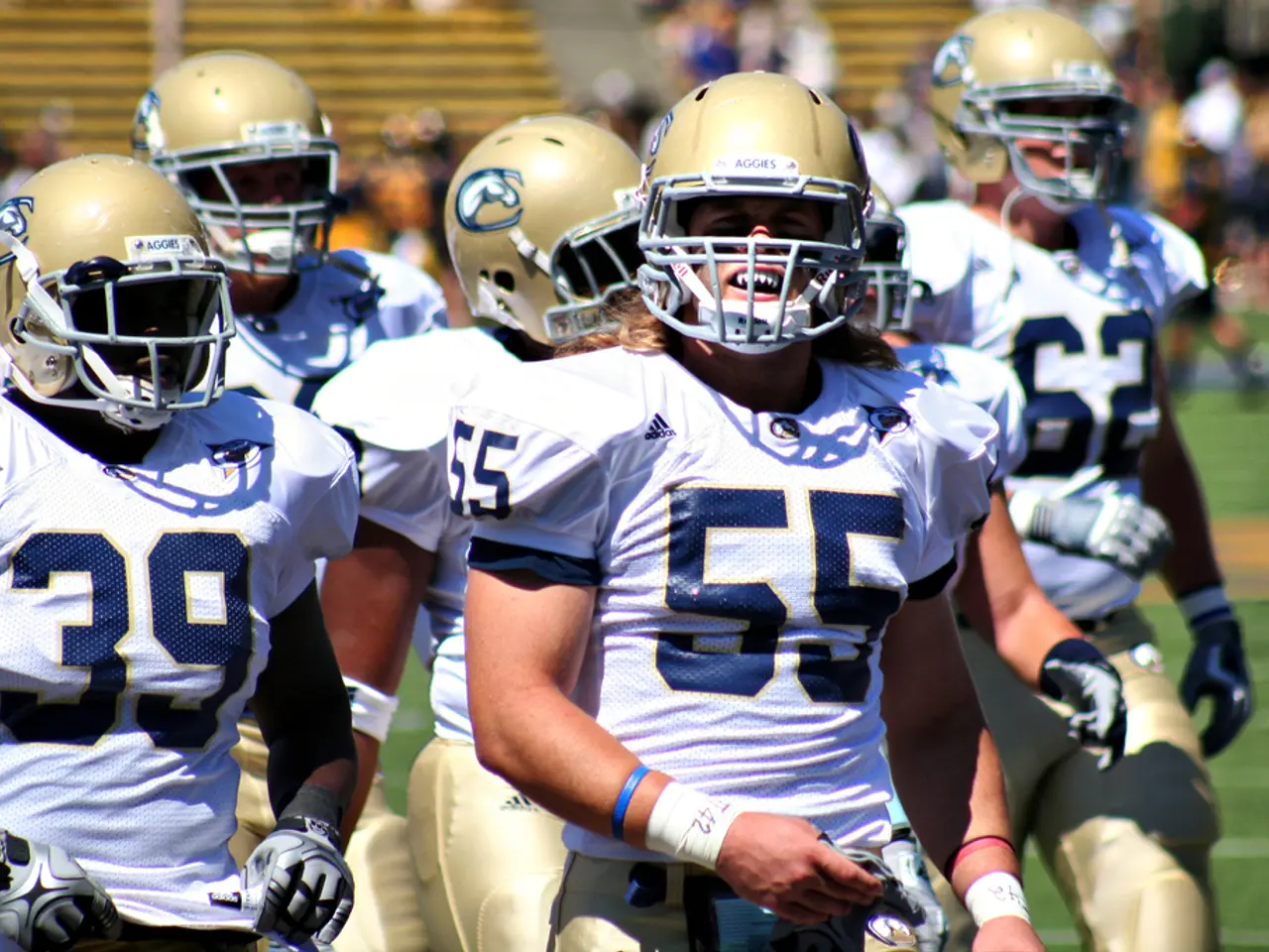 In this image we can see group of people wearing the same type of dress and helmet and numbering is...