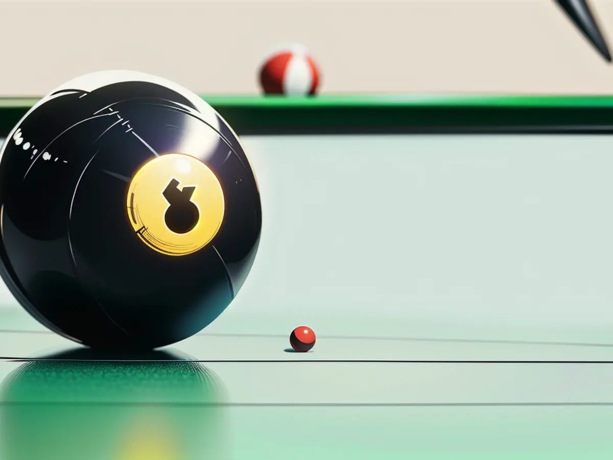 Up-close view of a dark snooker ball resting on a green billiards table.